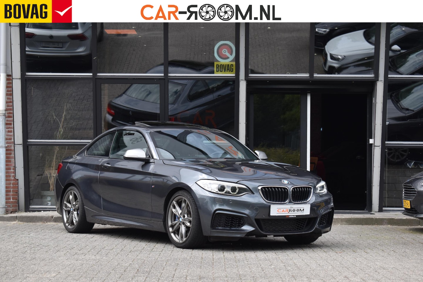 BMW 2-serie Coupé - M235i High Executive Keyless Pano H/K Camera - AutoWereld.nl