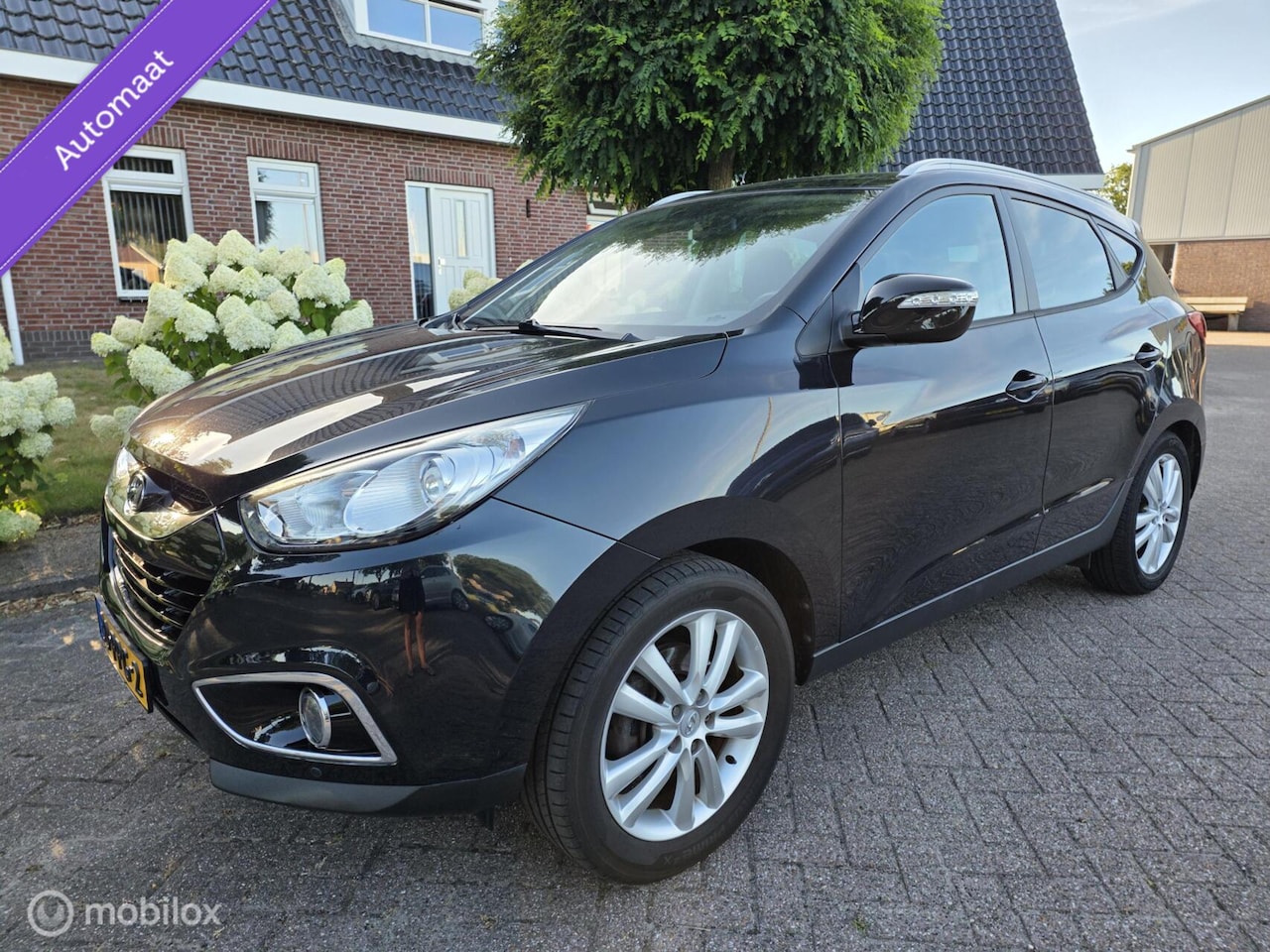 Hyundai ix35 - 2.0i i-Catcher/trekh afnb/navi/stoel&bank verw. - AutoWereld.nl