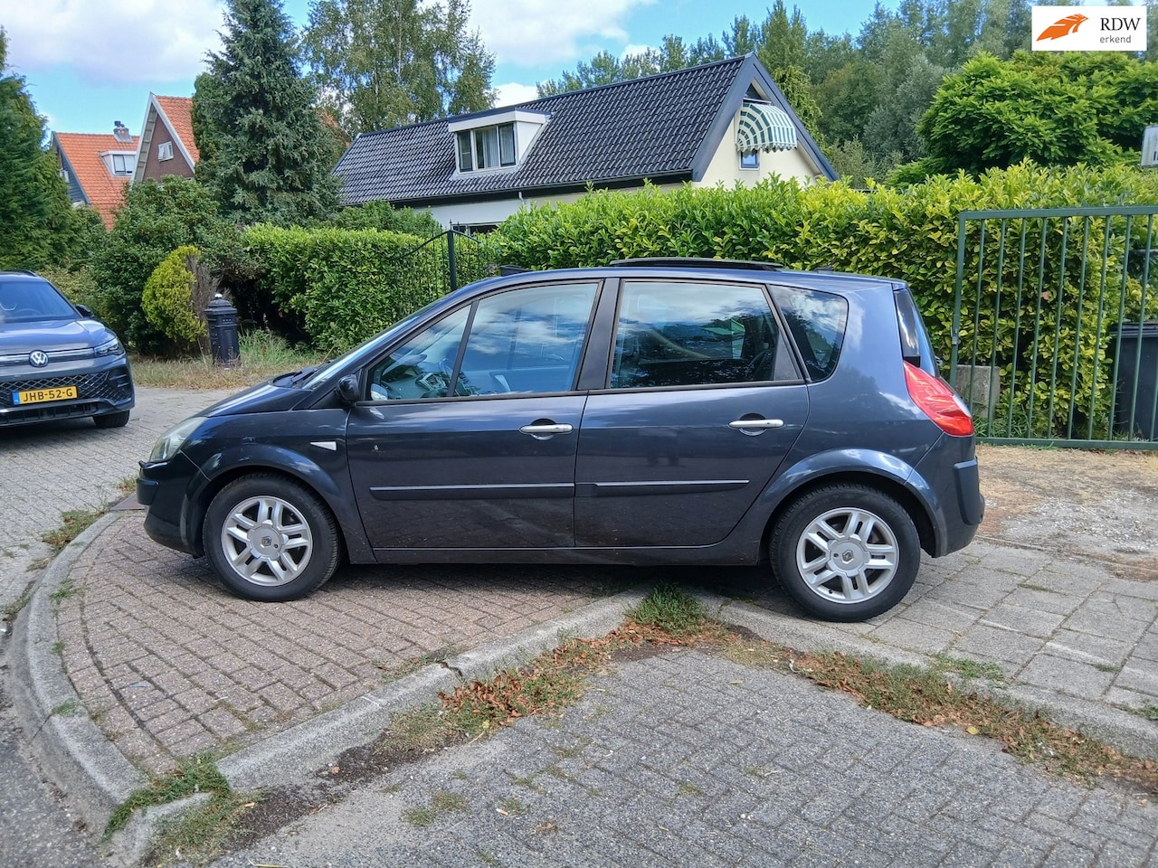 Renault Scénic - 2.0-16V Tech Line airco schuifdak navigatie trekhaak - AutoWereld.nl