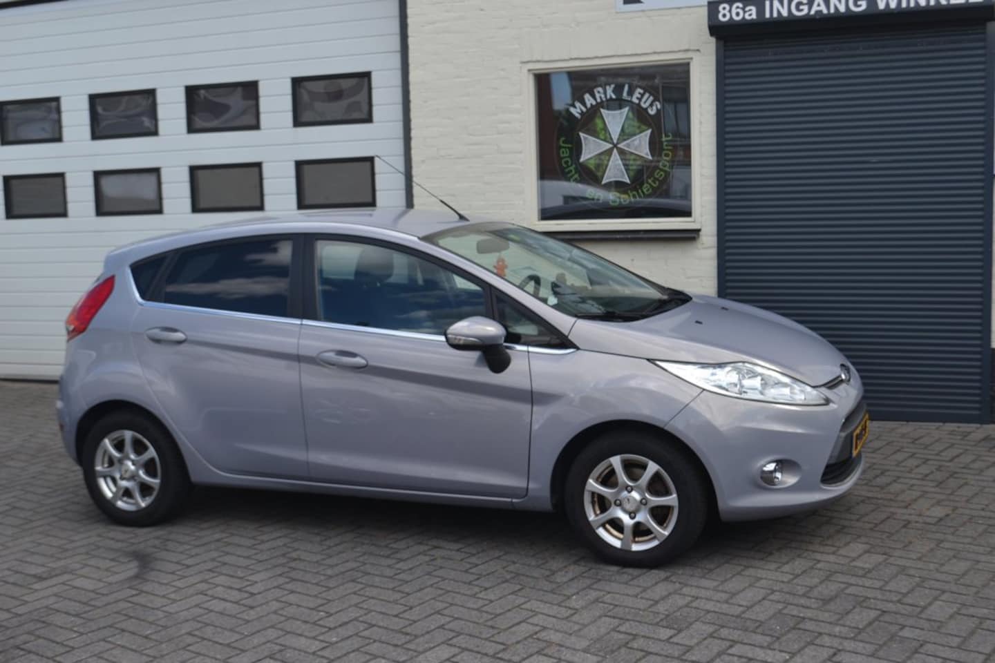 Ford Fiesta - 1.25 Titanium BIJZONDER MOOI - AutoWereld.nl