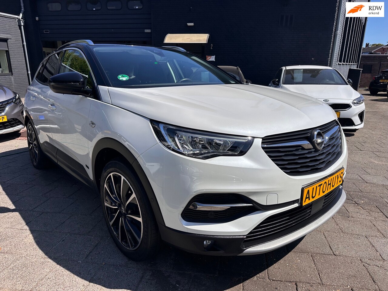 Opel Grandland X - 1.6 Turbo Hybrid4 Ultimate|Aut|4WD|300pk|Leder - AutoWereld.nl