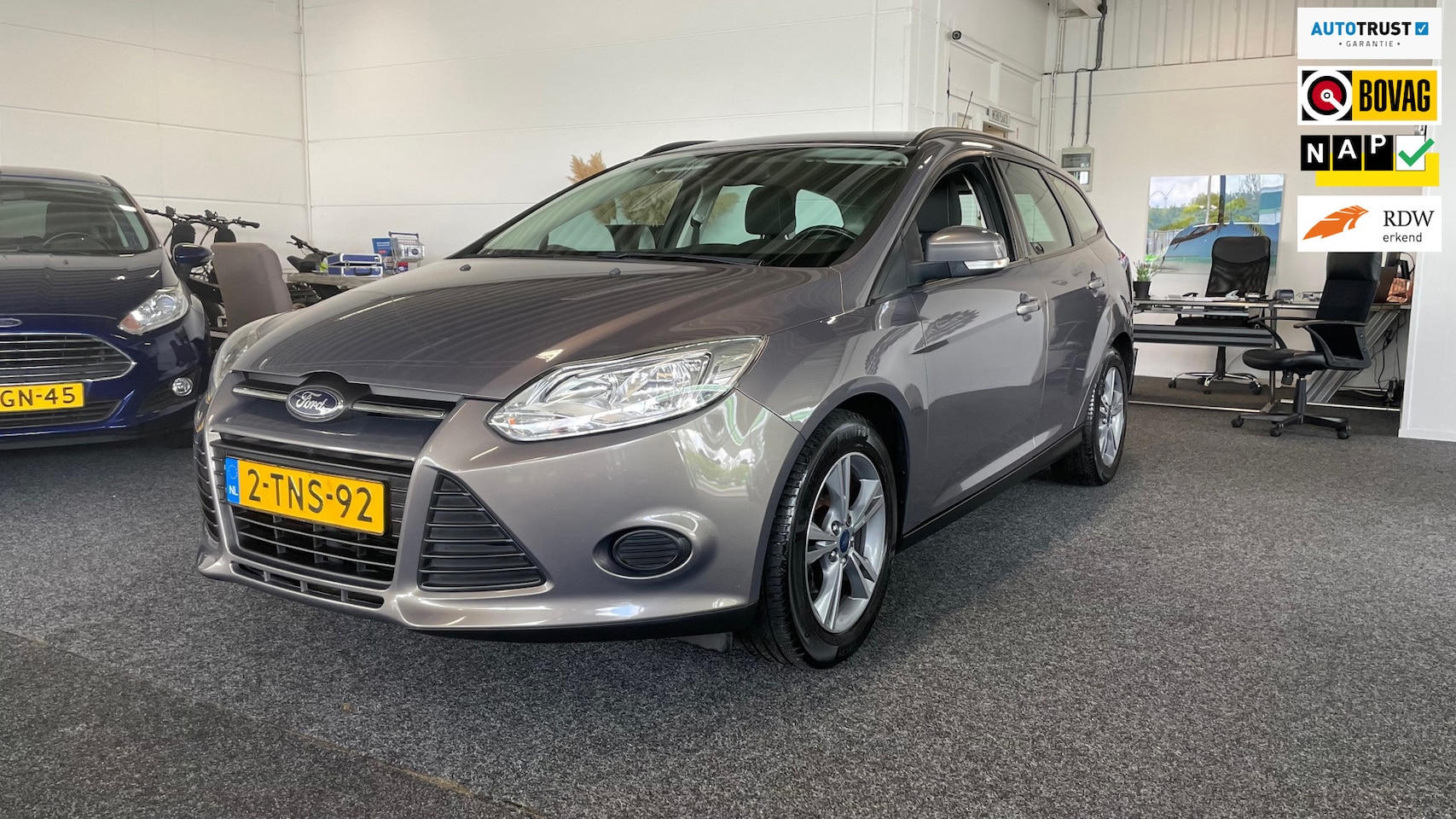 Ford Focus Wagon - 1.0 EcoBoost Edition 1.0 EcoBoost Edition, Cruise control, Airco, Nav - AutoWereld.nl