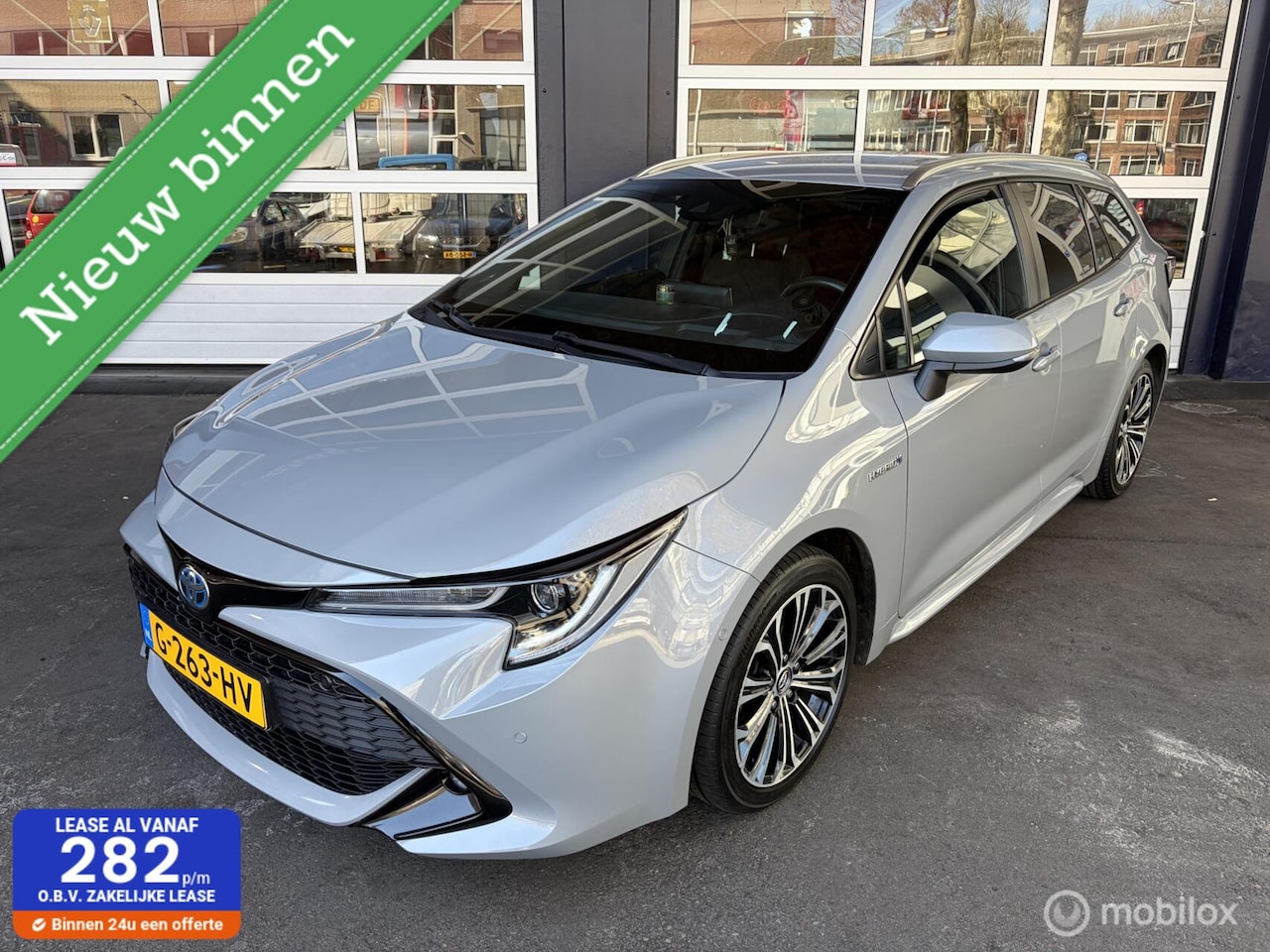 Toyota Corolla Touring Sports - 2.0 Hybrid /98DKM/NAP/LM Velg - AutoWereld.nl