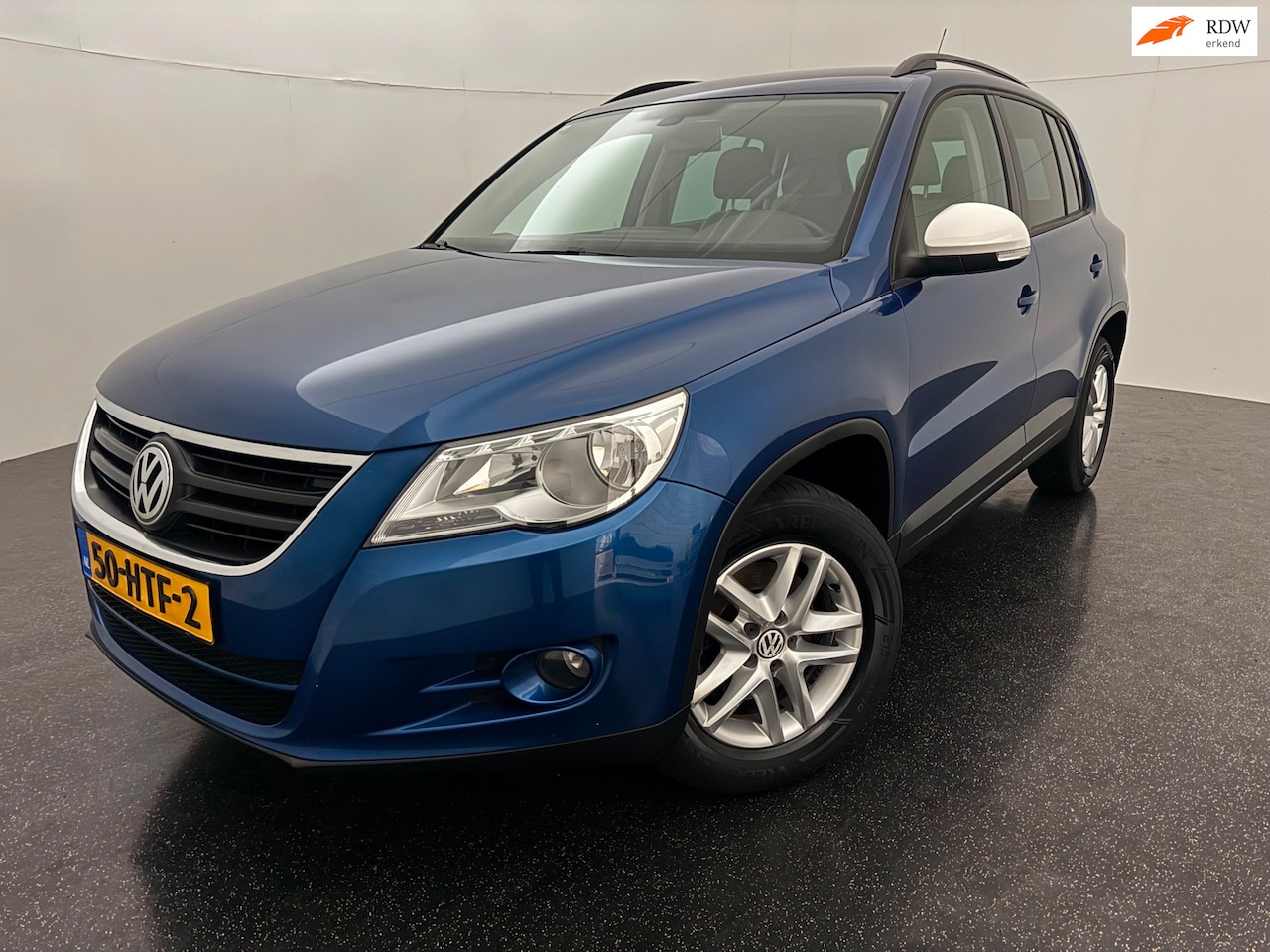 Volkswagen Tiguan - 1.4 TSI Comfort&Design 4Motion Trekhaak - AutoWereld.nl