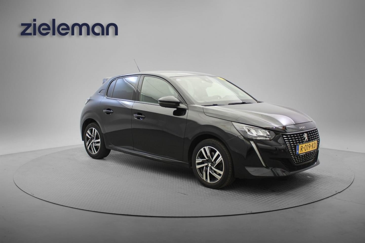 Peugeot 208 - 1.2 PureTech Allure - Digitaal Cockpit, Carplay, Camera, Half Leer - AutoWereld.nl