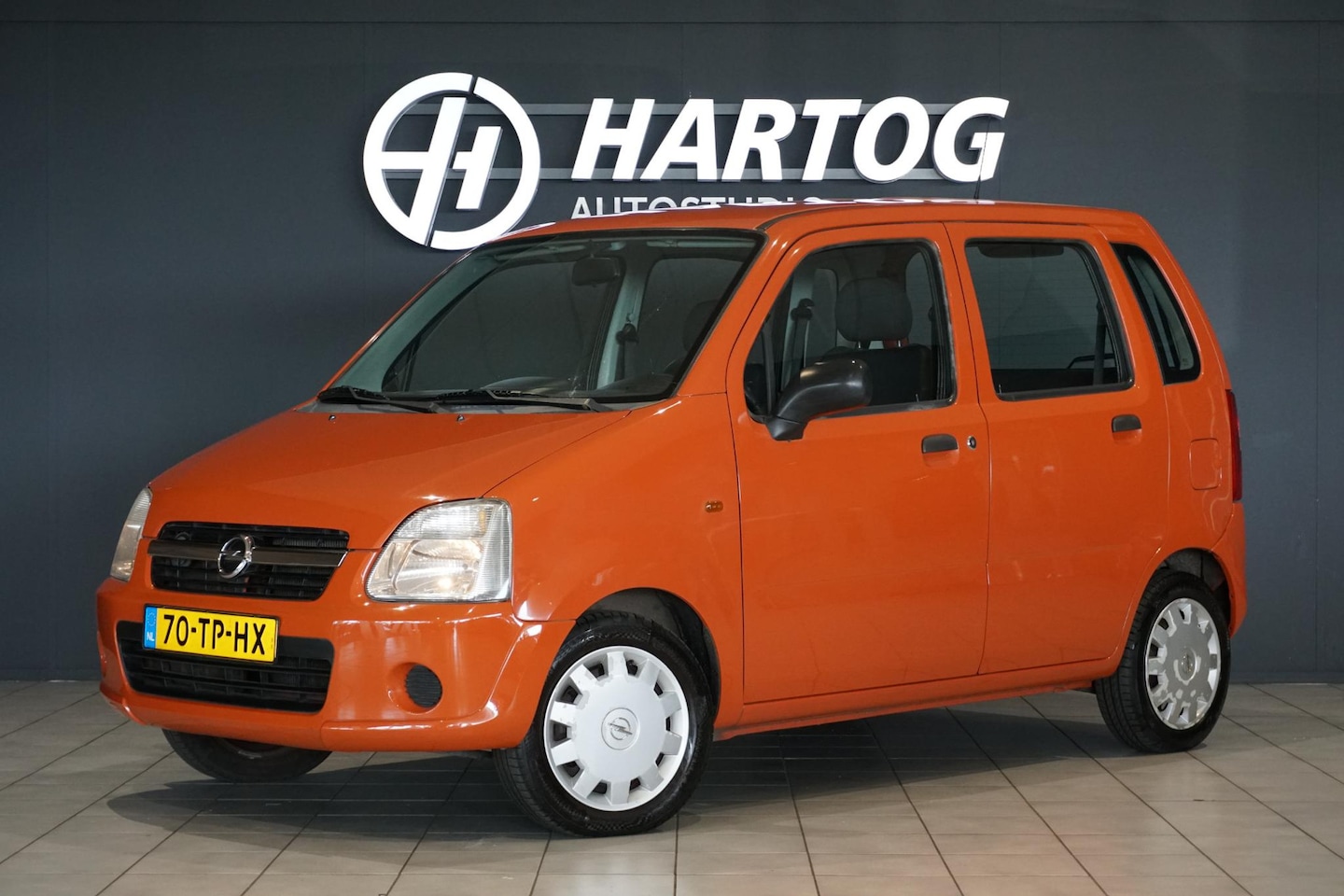 Opel Agila - 1.0-12V Essentia *EERSTE EIGENAAR* + DEALER ONDERHOUDEN / TERRA COTTA RED - AutoWereld.nl