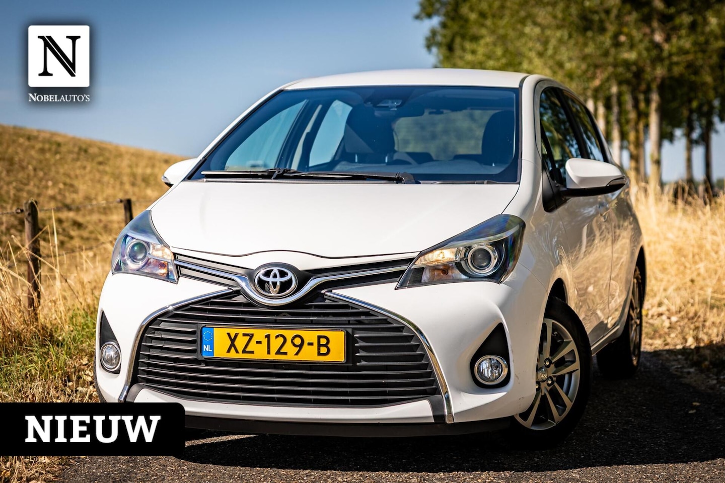 Toyota Yaris - 1.3 VVT-i Orange Sport |Camera |Cruise |Airco - AutoWereld.nl