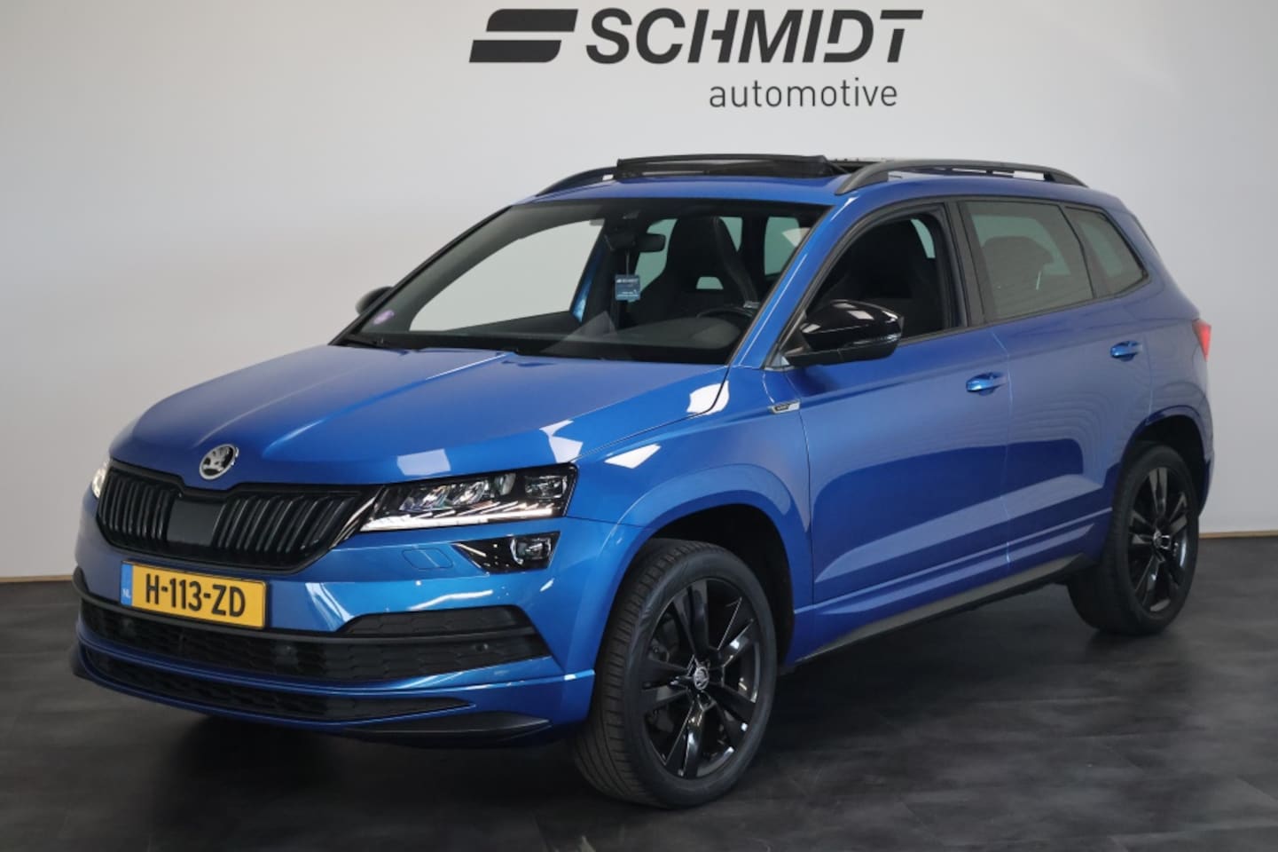 Skoda Karoq - 1.5 TSI Sportline Business 150pk DSG | Trekhaak | Panoramadak - AutoWereld.nl