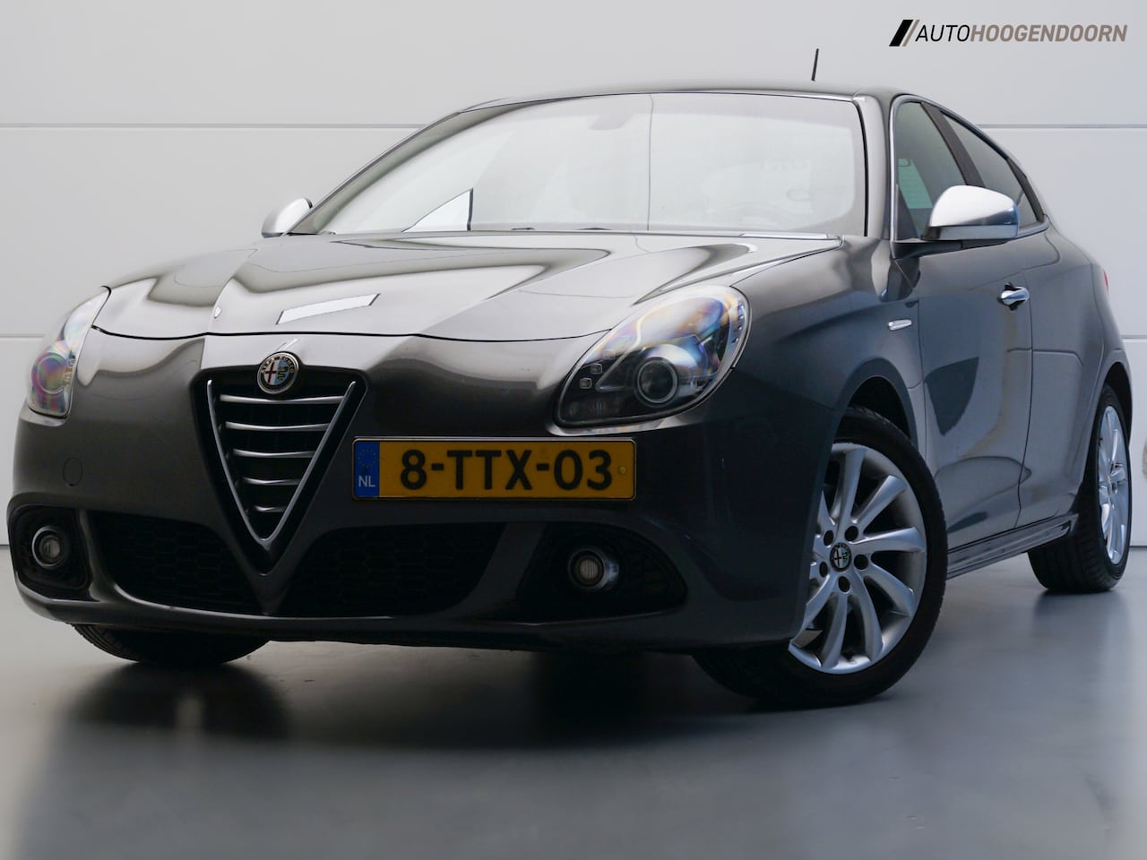 Alfa Romeo Giulietta - 1.4 T Exclusive Sport (AUTOMAAT,PARKEERSENSOREN,CLIMATE,CRUISE,BLUETOOTH,NAVIGATIE,LM-VELG - AutoWereld.nl
