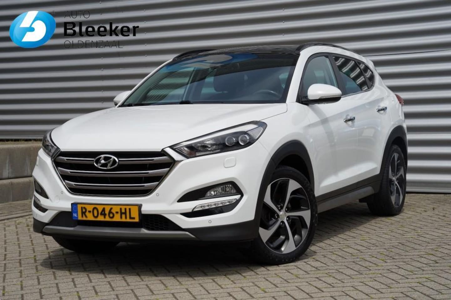 Hyundai Tucson - 1.6 T-GDI 177PK Premium 4WD Ecc Cruise Navi Pano Trekhaak PDC - AutoWereld.nl