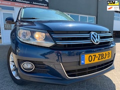 Volkswagen Tiguan - 1.4 TSI Sport&Style van 2de Eig met trekhaak en parkeersensoren en airco en cruise control