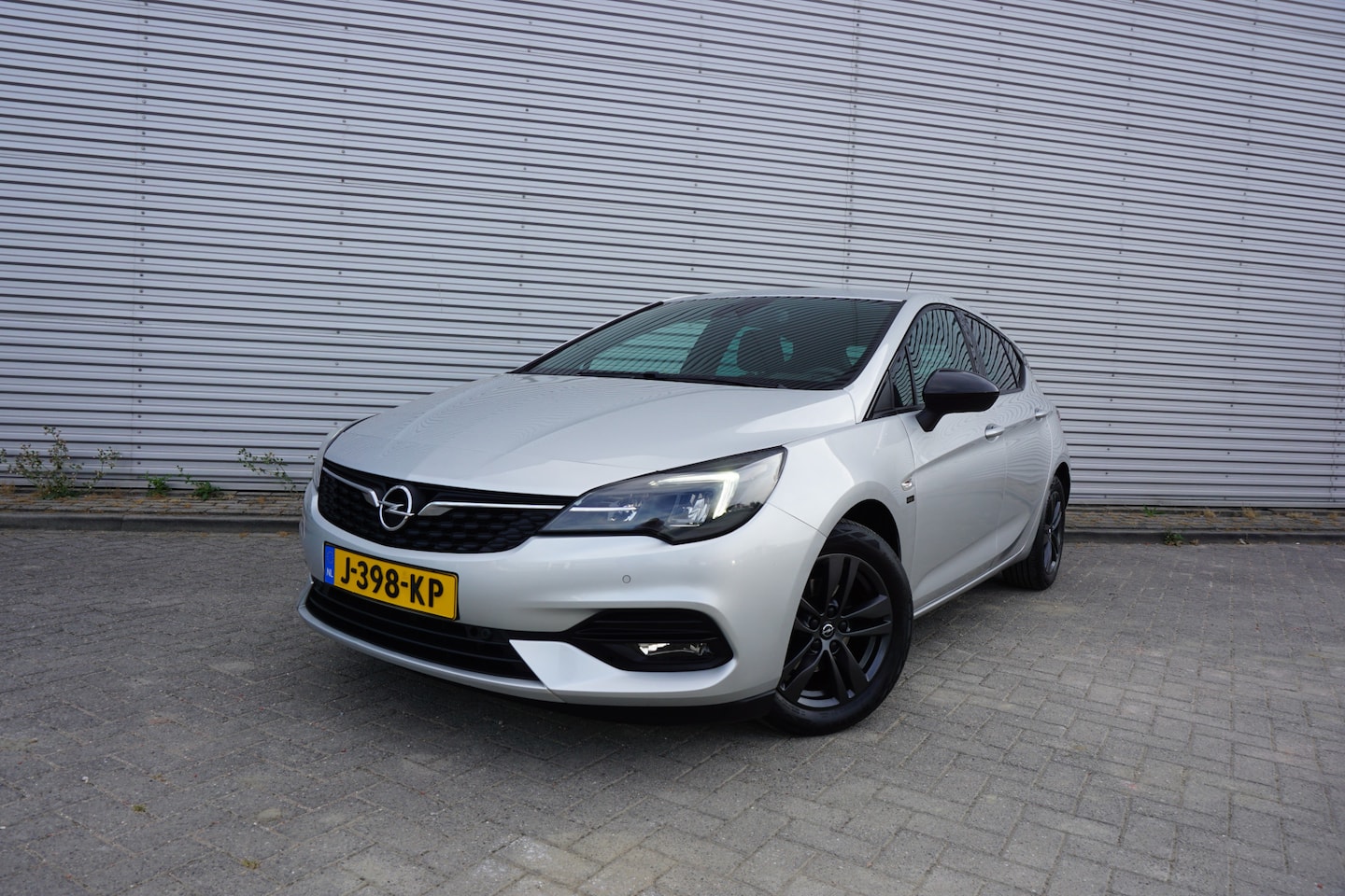Opel Astra - 1.2 Edition 2020 Airco / Navi / Cruise / Camera / Carplay / Elektr. ramen / Parkeers. / Lm - AutoWereld.nl