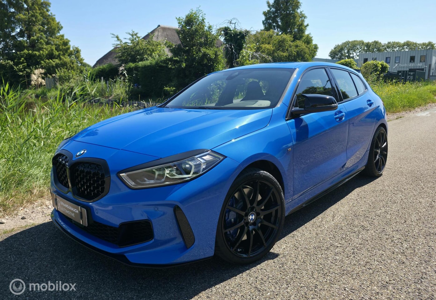 BMW 1-serie - M135i xDrive / Navi / Carplay / Trekh. / 19 inch - AutoWereld.nl