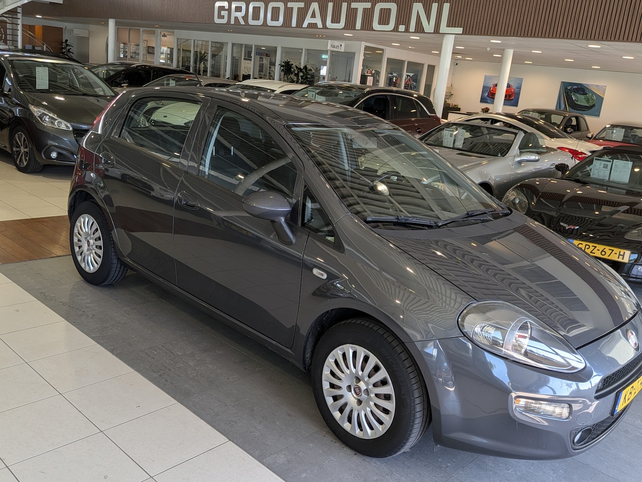 Fiat Punto Evo - 0.9 TwinAir Lounge Airco, Cruise Control, Trekhaak, Stuurbekrachtiging - AutoWereld.nl