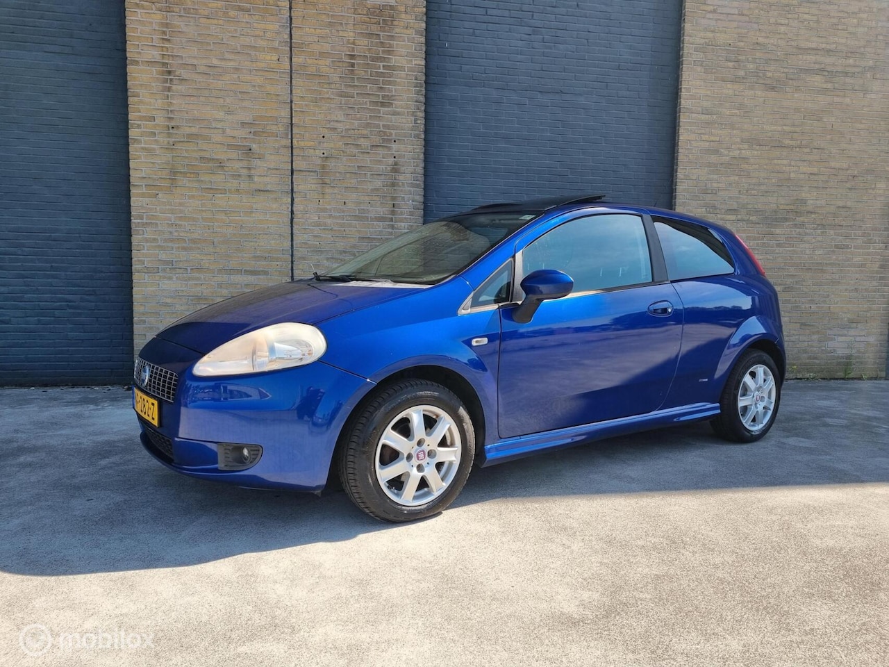 Fiat Punto - 1.2-16V SportSound pano airco - AutoWereld.nl