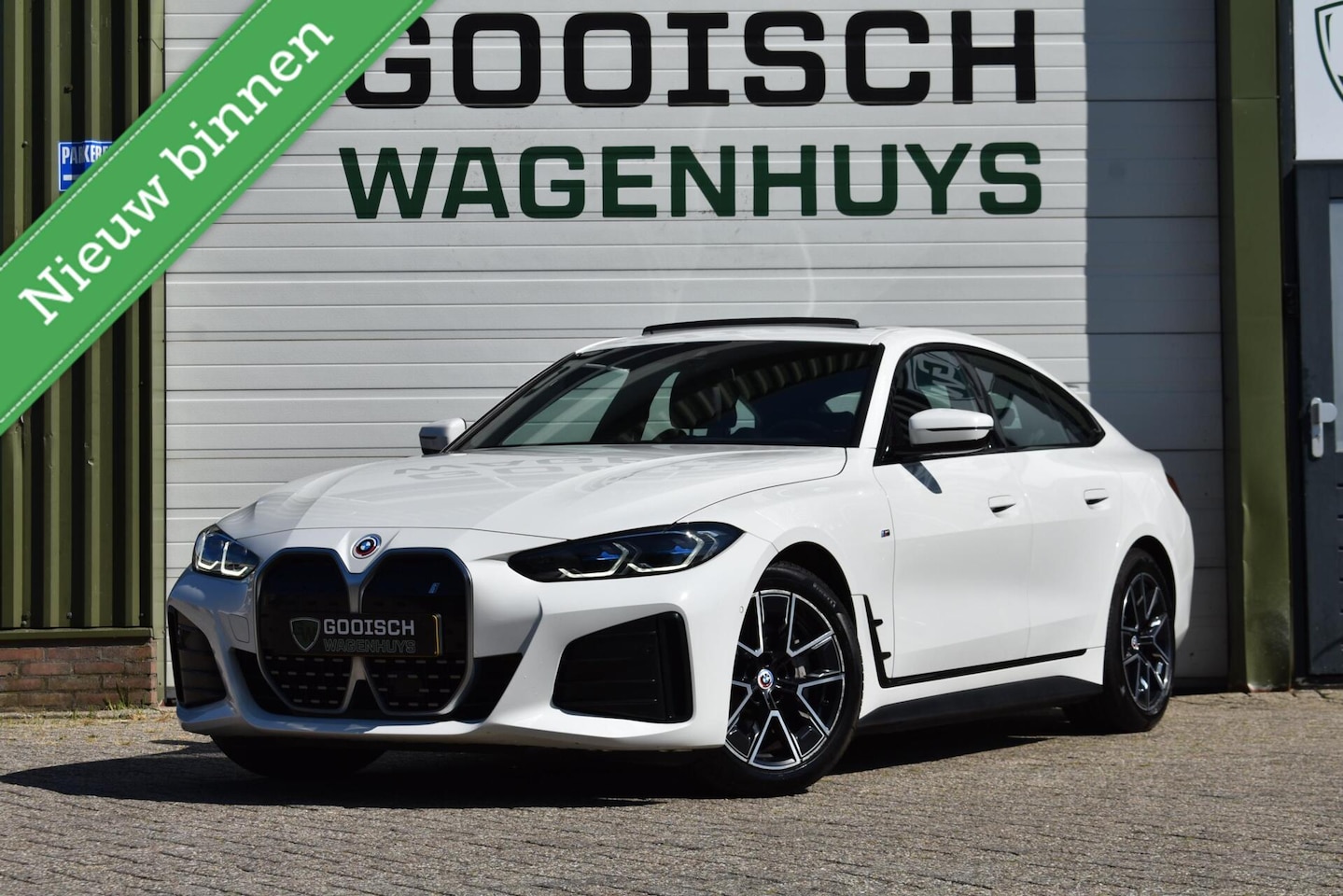 BMW i4 - eDrive40 High Executive 84 kWh M Sport | Pano | Leder | - AutoWereld.nl