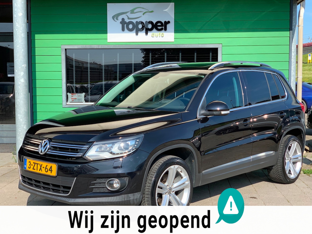 Volkswagen Tiguan - 2.0 TSI Sport&Style 4Motion|Automat|Pano|Stoelverwarming - AutoWereld.nl