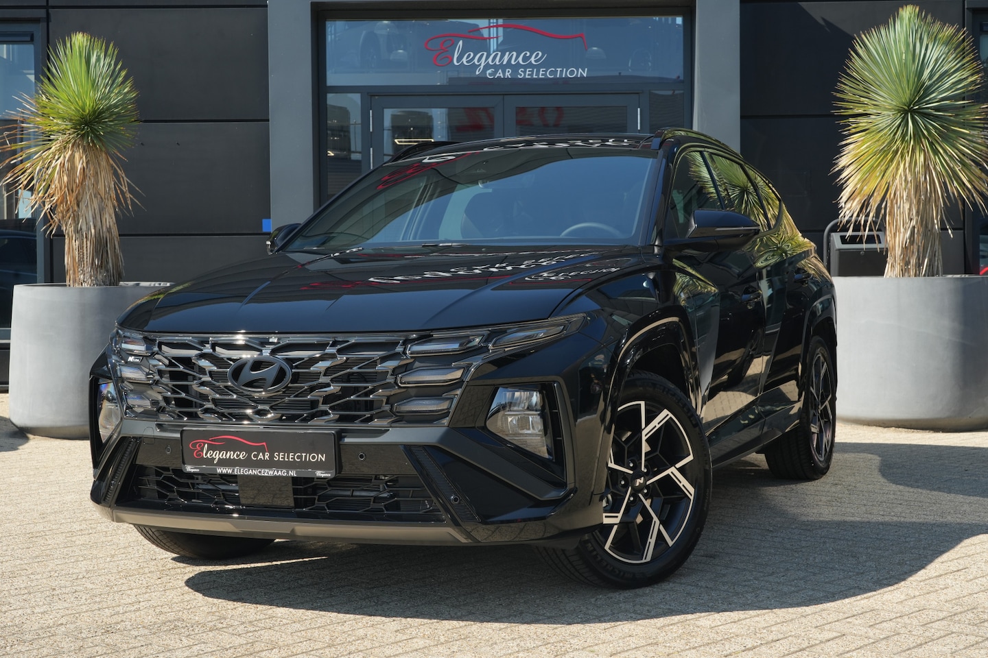 Hyundai Tucson - 1.6 T-GDI PHEV N Line 4WD 288pk Panoramadak/Navigatie/Camera - AutoWereld.nl
