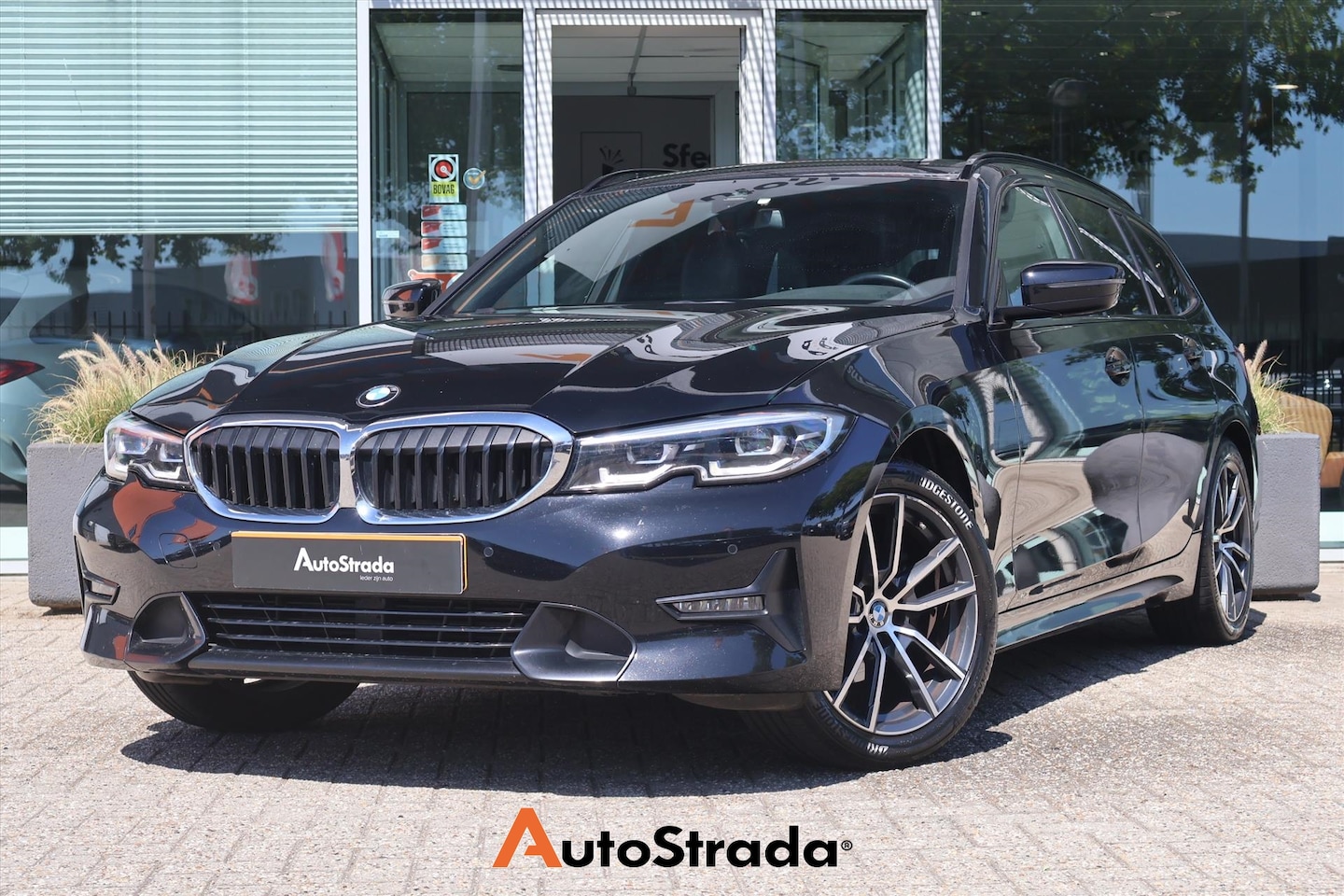 BMW 3-serie Touring - (g21) 318i Business Edition 156pk | LED | Cruise | Climate | Navi | Carplay | Virtual - AutoWereld.nl