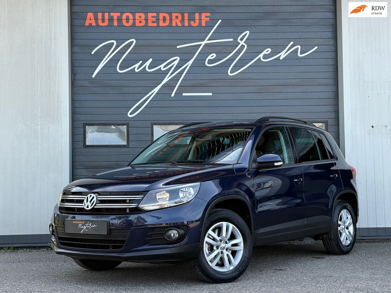 Volkswagen Tiguan - 1.4 TSI Comfort&Design|Trekhaak|Park assist|Clima - AutoWereld.nl