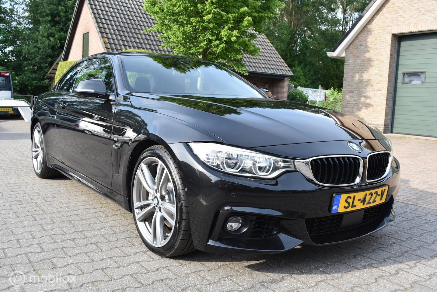 BMW 4-serie Cabrio - 435i High Executive M Sport 340pk voll - AutoWereld.nl