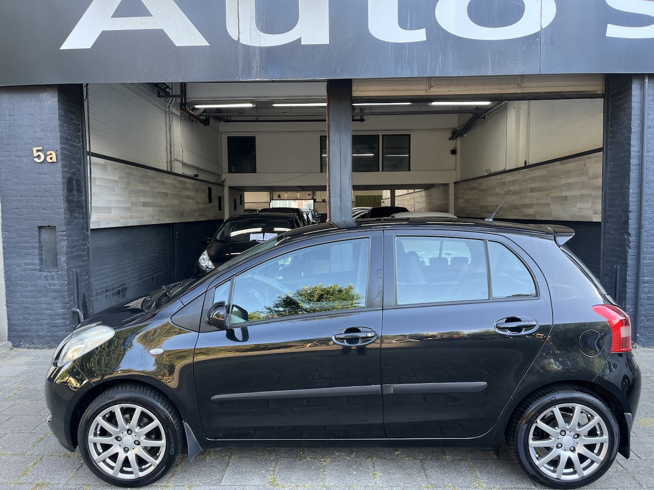 Toyota Yaris - 1.3 VVTi Sol Automaat Airco Leer - AutoWereld.nl