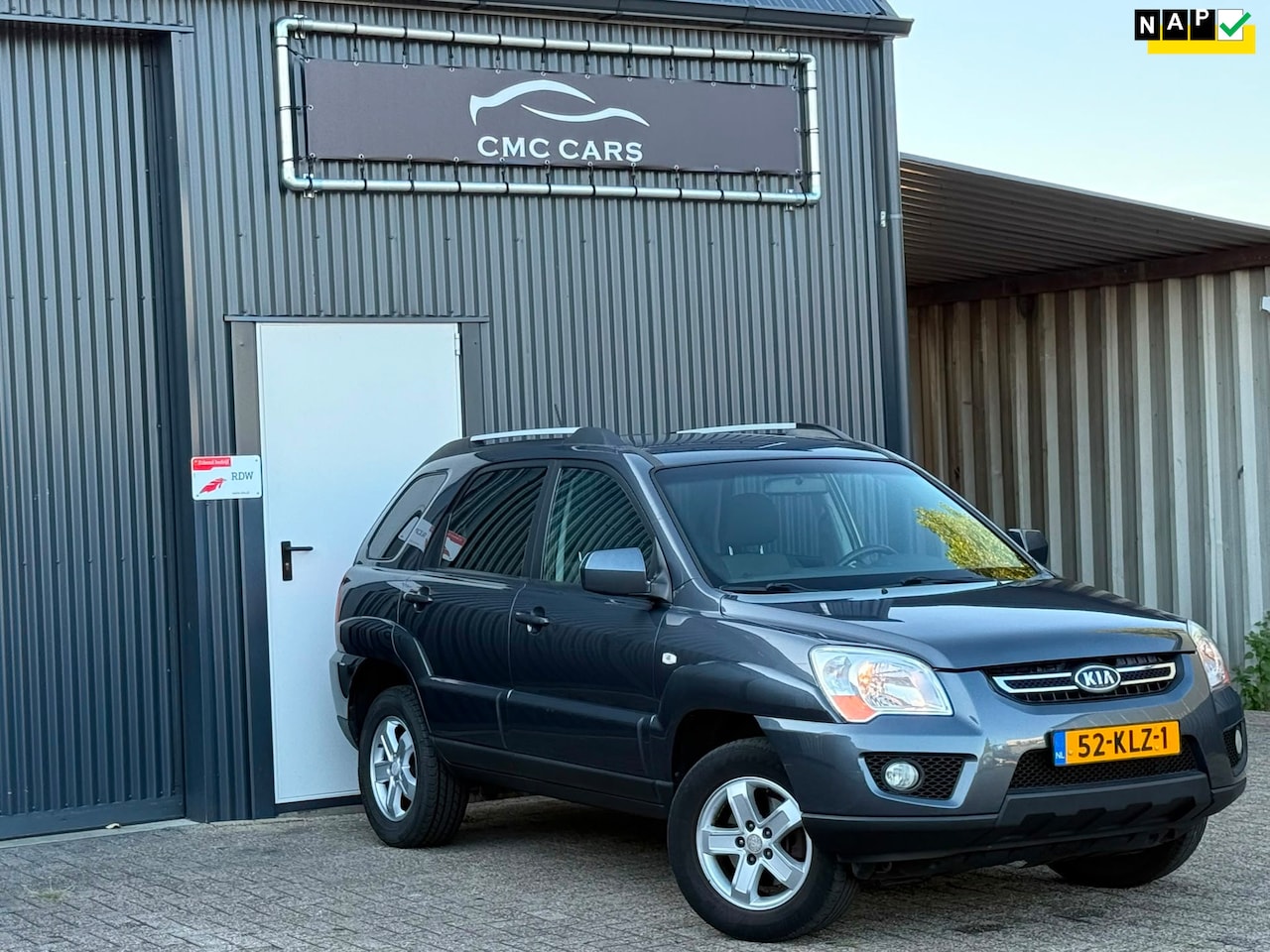 Kia Sportage - 2.0 CVVT X-ecutive 4WD 2E EIGENAAR!! VOLLEDIG ONDERHOUDEN!! - AutoWereld.nl