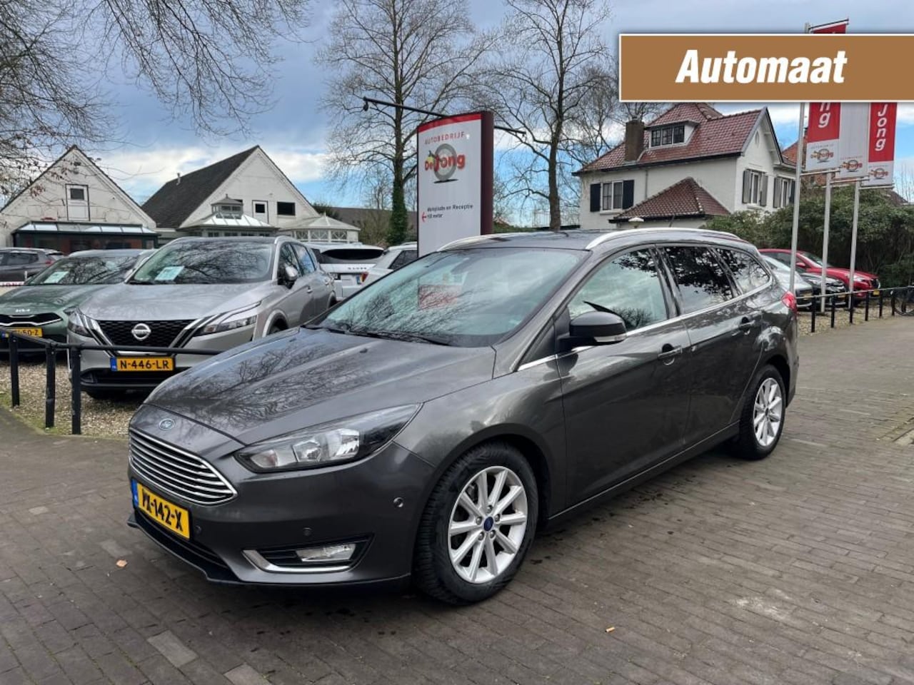 Ford Focus Wagon - WAGON 1.5 TDCI TITANIUM AUTOMAAT / NAVI / STOEL+STUUR VERWARMING / AFN. TREKHAAK - AutoWereld.nl