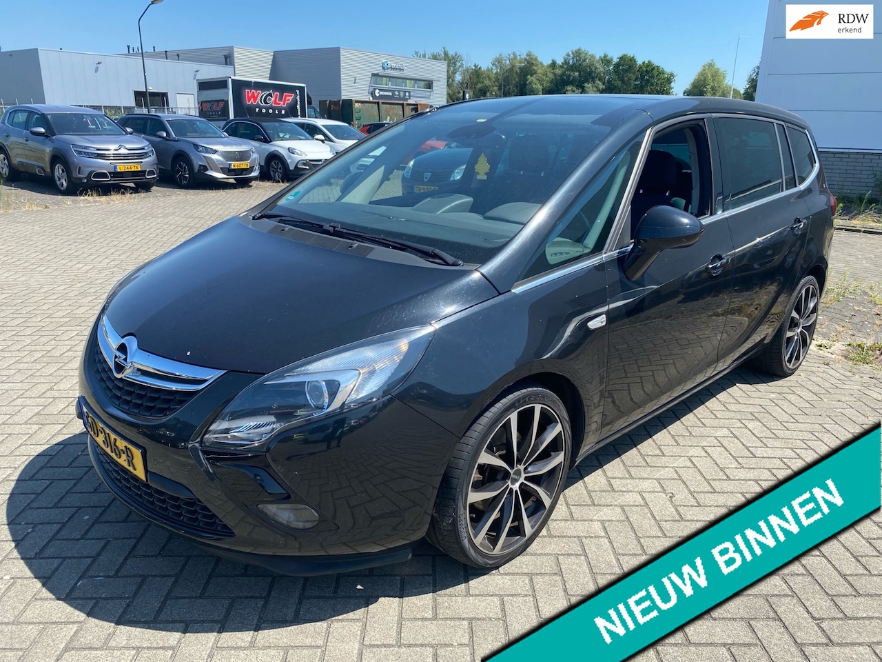 Opel Zafira Tourer - 1.4 Cosmo 140pk 7-persoons Clima Navi Panorama Xenon - AutoWereld.nl
