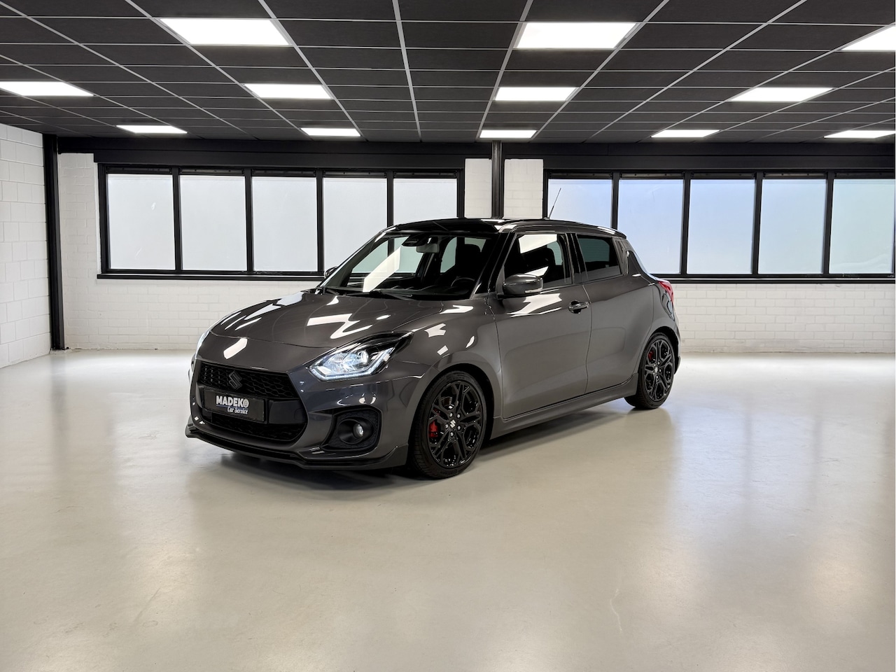 Suzuki Swift - 1.4 Sport Smart Hybrid |Led|Cam|CarPlay - AutoWereld.nl