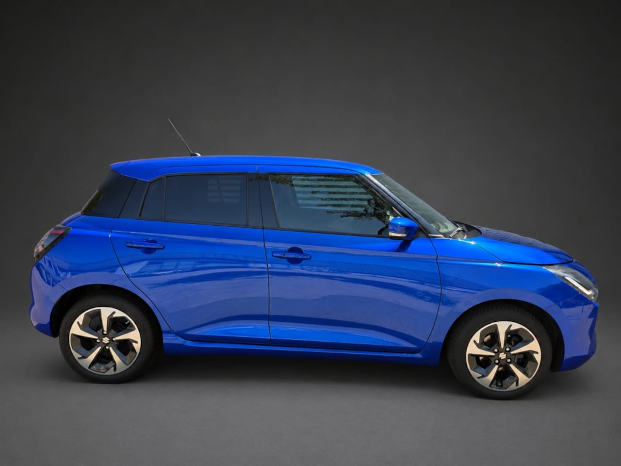 Suzuki Swift - 1.2 Style Smart Hybr - AutoWereld.nl