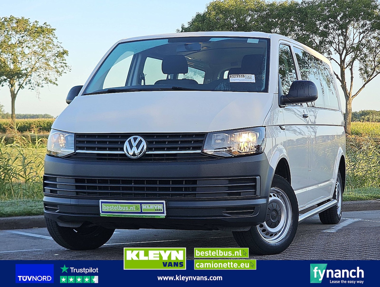 Volkswagen Transporter - 2.0 TDI L2H1 Combi 9-pers AC - AutoWereld.nl
