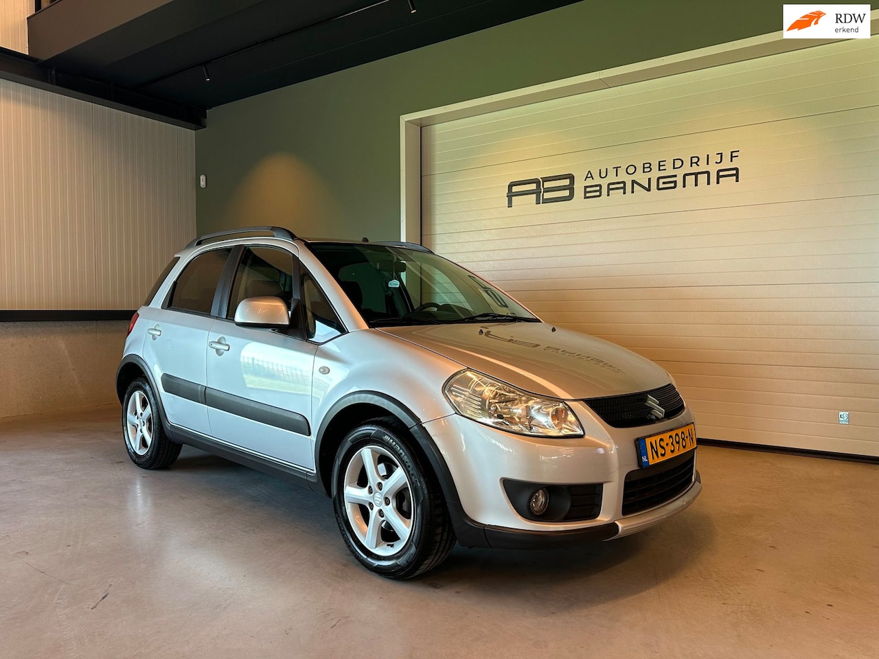 Suzuki SX4 - 1.6 COMFORT|STOELVERWARMING|KEYLESS ENTREE|CLIMATRONIC AIRCO|LM-VELGEN|GETINT GLAS|HOGERE - AutoWereld.nl