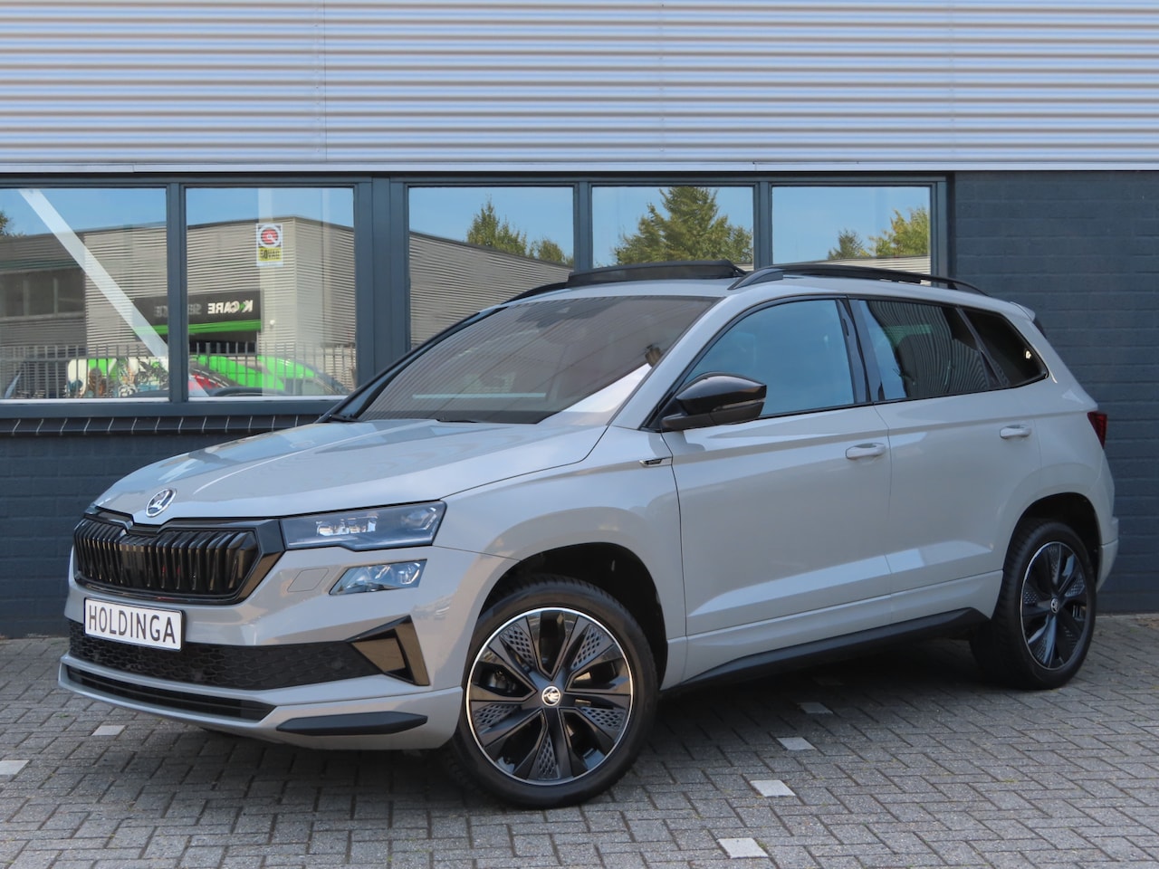 Skoda Karoq - 1.5 TSI ACT Sportline Business DSG | pano dak | trekhaak wegklapbaar | verwarmbare voorrui - AutoWereld.nl
