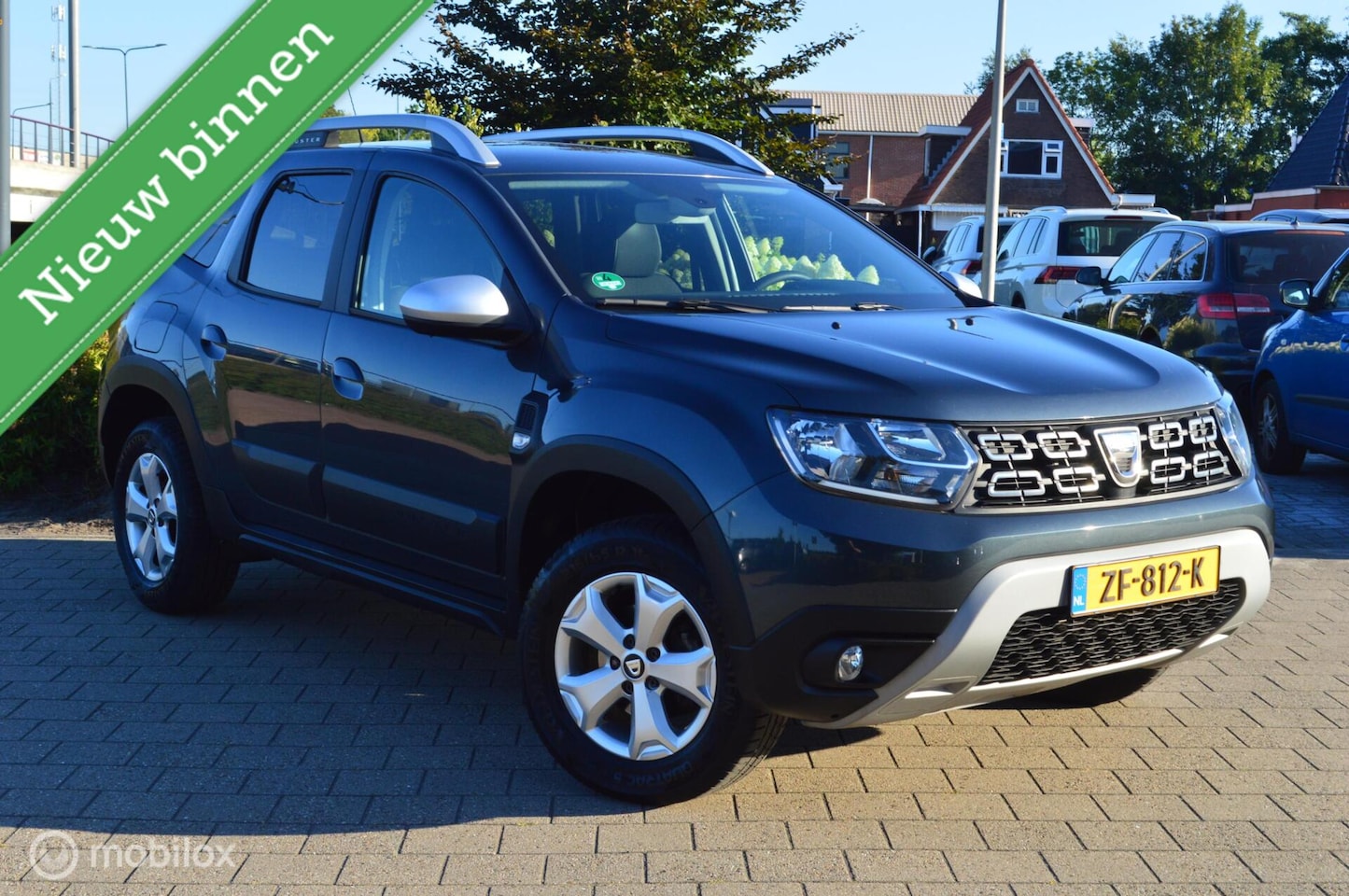 Dacia Duster - 1.2 TCe Comfort | 51.000km | Trekhaak-1500kg - AutoWereld.nl