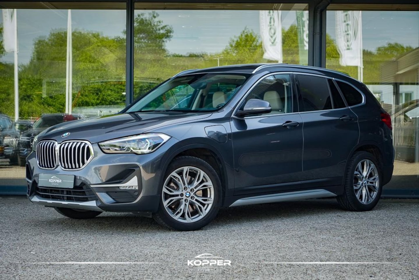 BMW X1 - xDrive25e High Executive Edition / Pano / Leder / Harman Kardon / Camera / Adaptive Cruise - AutoWereld.nl