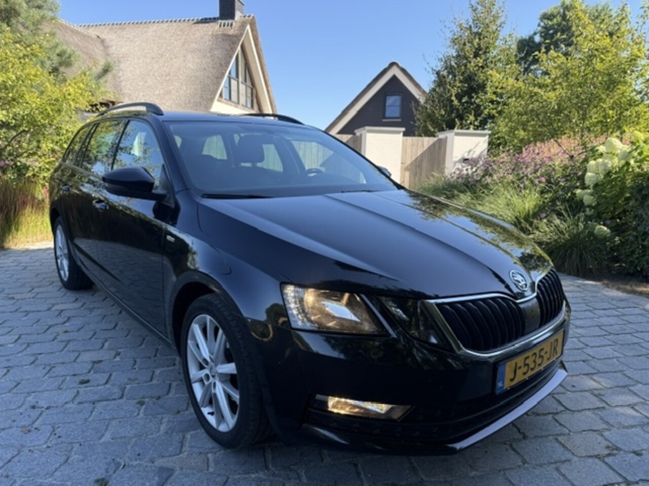 Skoda Octavia - 1.6 TDI Sport Bns - AutoWereld.nl