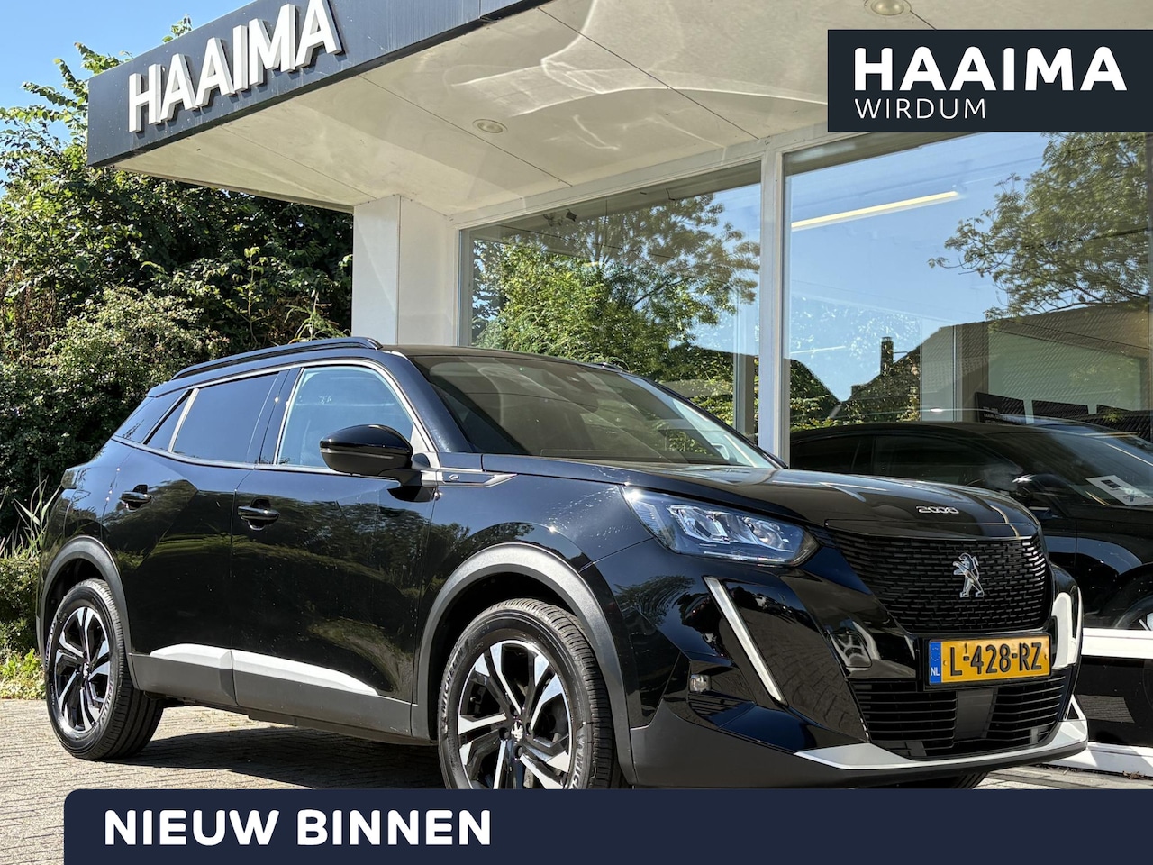 Peugeot e-2008 - EV Blue Lease Allure 50 kWh | 3-fase | Stoelverwarming | Achteruitrijcamera | Navi | Adapt - AutoWereld.nl
