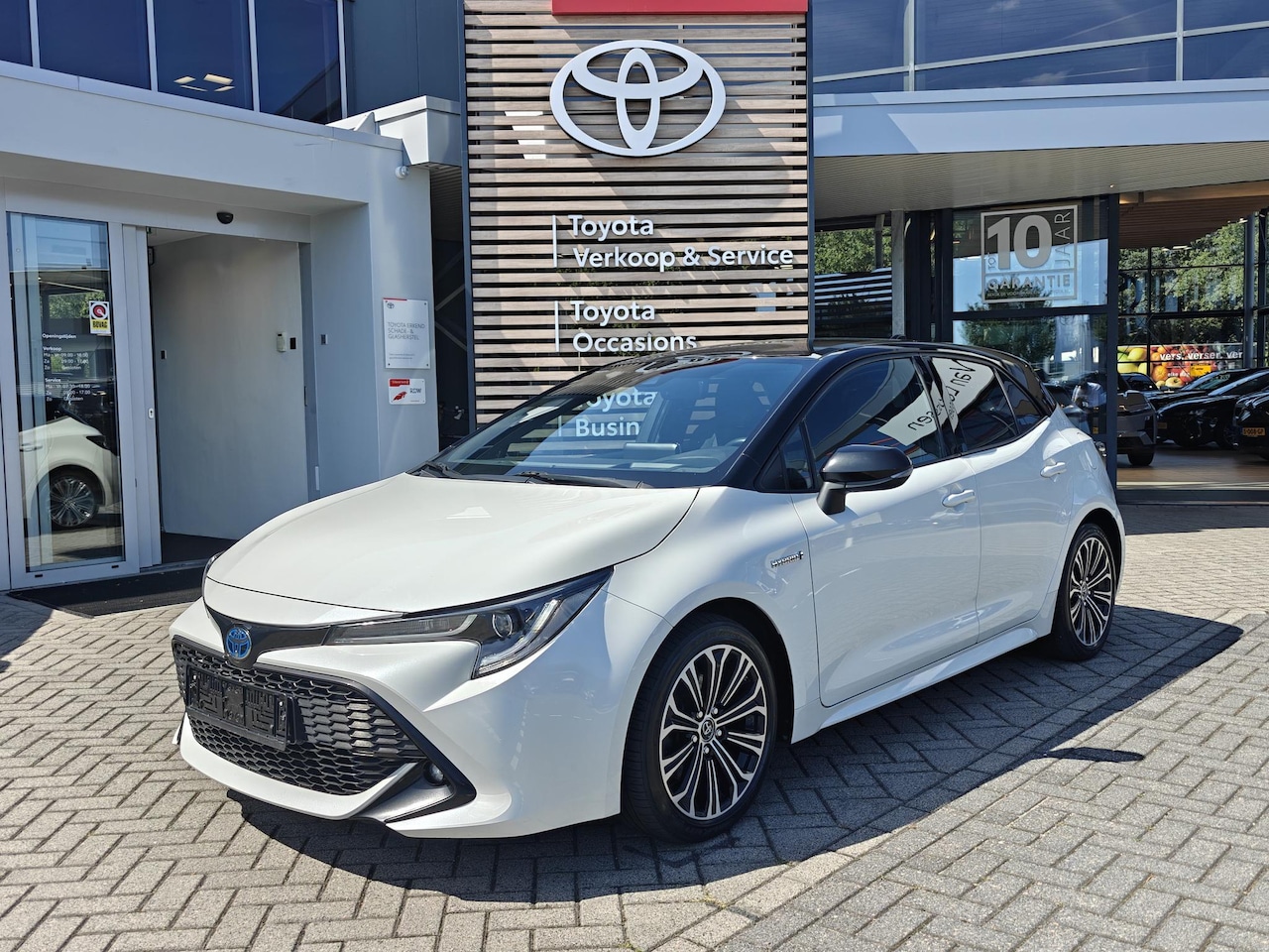 Toyota Corolla - 2.0 Hybrid BI-TONE STOEL/STUURVERW APPLE/ANDROID DAB+ CAMERA LM-VELGEN - AutoWereld.nl