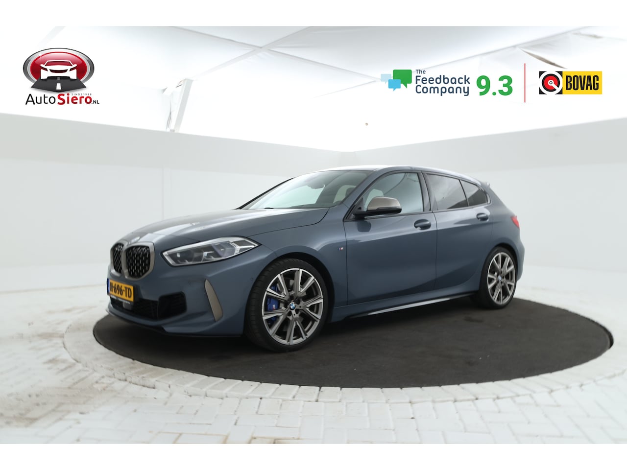 BMW 1-serie - M135i xDrive High Executive Edition Head Up Display, Automaat, Panorama Dak! - AutoWereld.nl