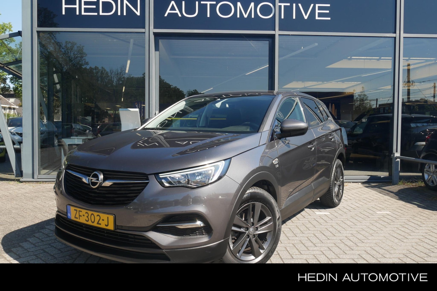 Opel Grandland X - 1.2 Turbo 120 Jaar Edition | PDC Voor & Achter | Trekhaak | All-Season Banden | LMV 17 inc - AutoWereld.nl