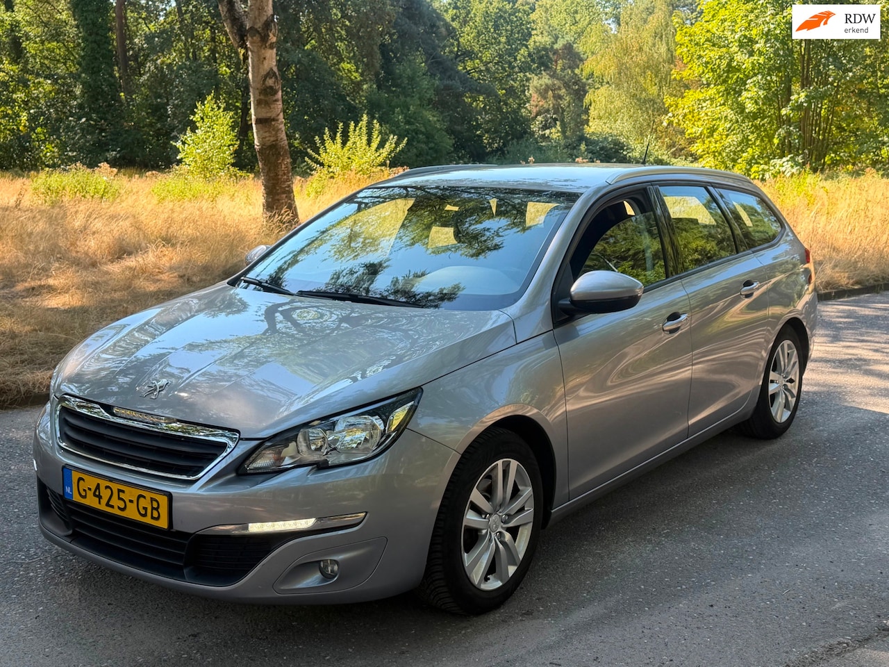 Peugeot 308 SW - 1.2 PureTech Blue Lease Executive 2014 - AutoWereld.nl