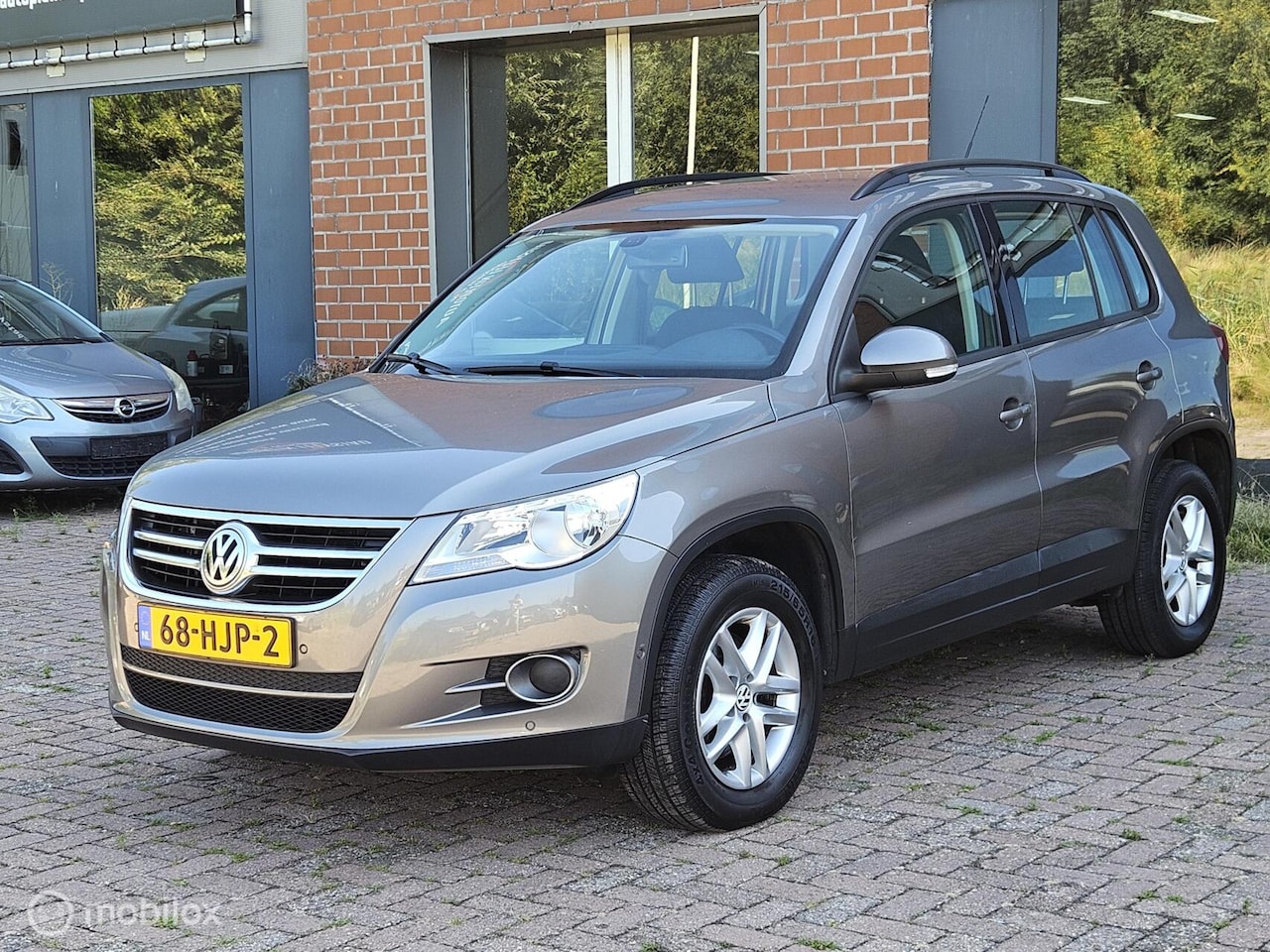 Volkswagen Tiguan - 1.4 TSI PDC/Airco/Navi/cruise control/2e eigenaar - AutoWereld.nl