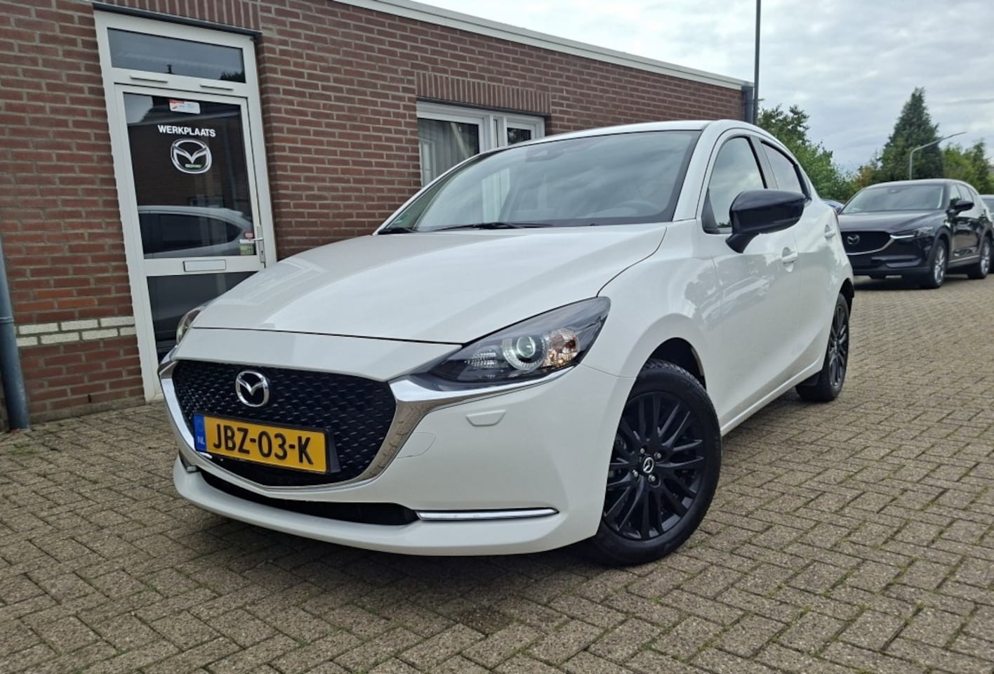 Mazda 2 - 1.5 SKYACT-G LUXURY AUTOMAAT / CAMERA / CARPLAY / CRUISE / STOELVERW - AutoWereld.nl