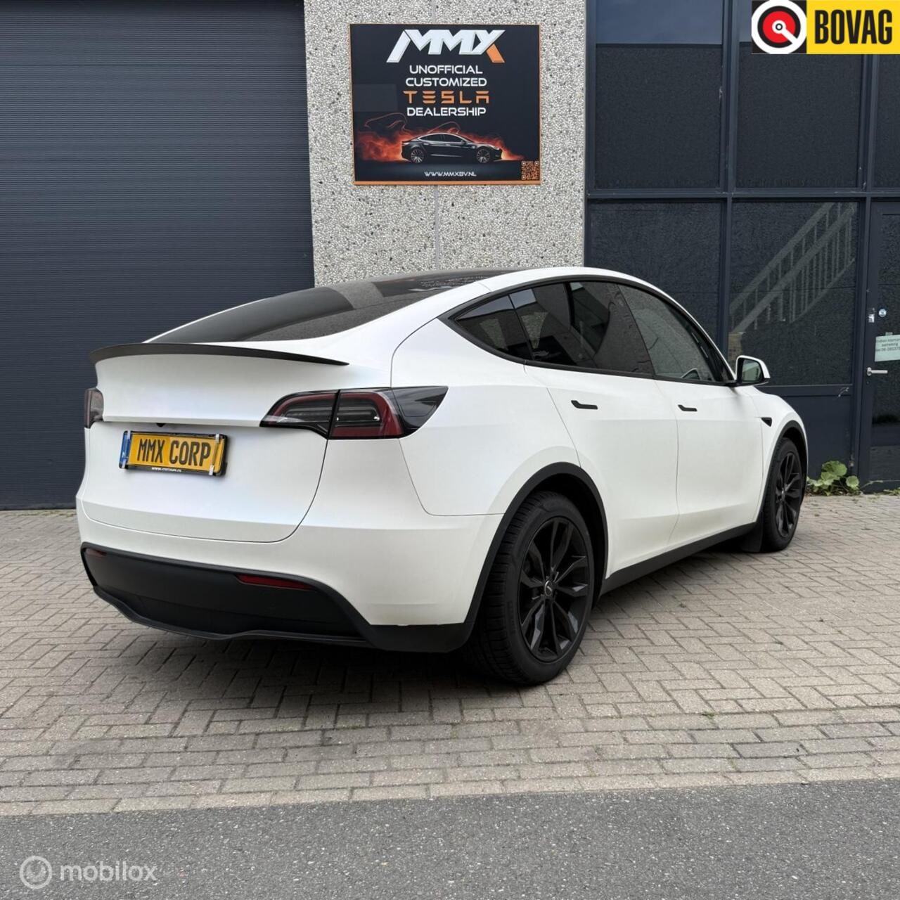 Tesla Model Y - LR AWD MMX PACK + SATINWRAP + ALCANTARA + HW4 - AutoWereld.nl