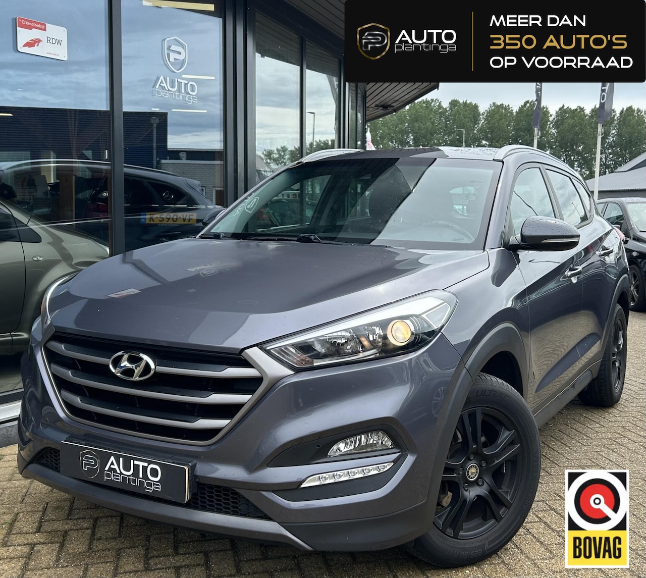 Hyundai Tucson - 1.6 T-GDi Comfort 177PK | Onderhoudshistorie | Achteruitrijcamera | Navigatie | Parkeersen - AutoWereld.nl