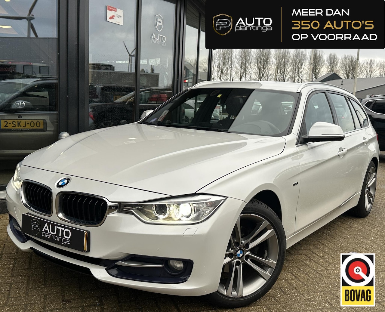 BMW 3-serie Touring - 316i High Executive | AUTOMAAT | NL AUTO | Sport-Line | Leer | Stoelverwarming | Navigatie - AutoWereld.nl