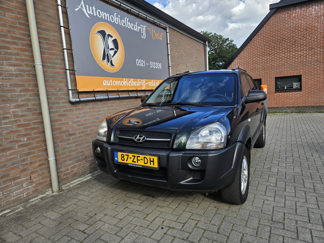 Hyundai Tucson - 2.0i Dynamic 2.0i Dynamic - AutoWereld.nl