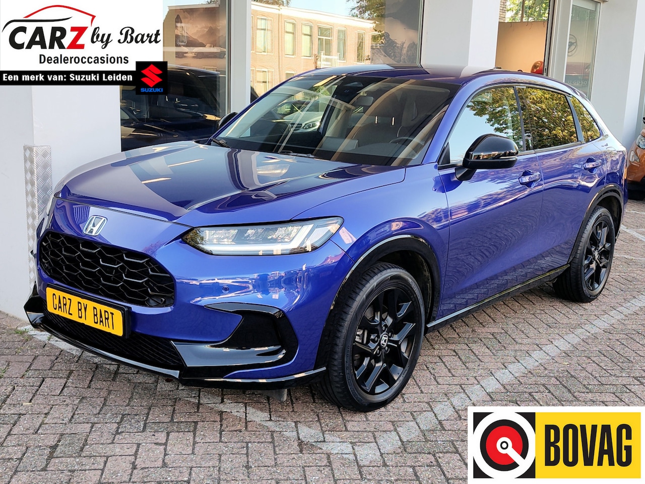 Honda ZR-V - 2.0 e:HEV SPORT Keyless | Elek. verst. stoel | Adaptive Cruise - AutoWereld.nl