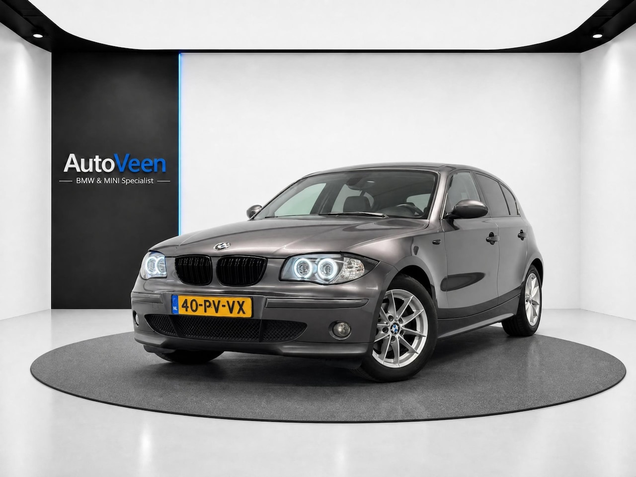 BMW 1-serie - 116i High Executive (LED, CRUISE, LEDER, GOED ONDERHOUDEN) - AutoWereld.nl